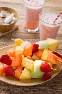 Fruit kebabs and smoothies